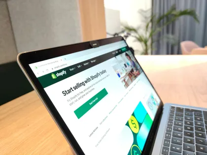 Laptop with Shopify website on screen
